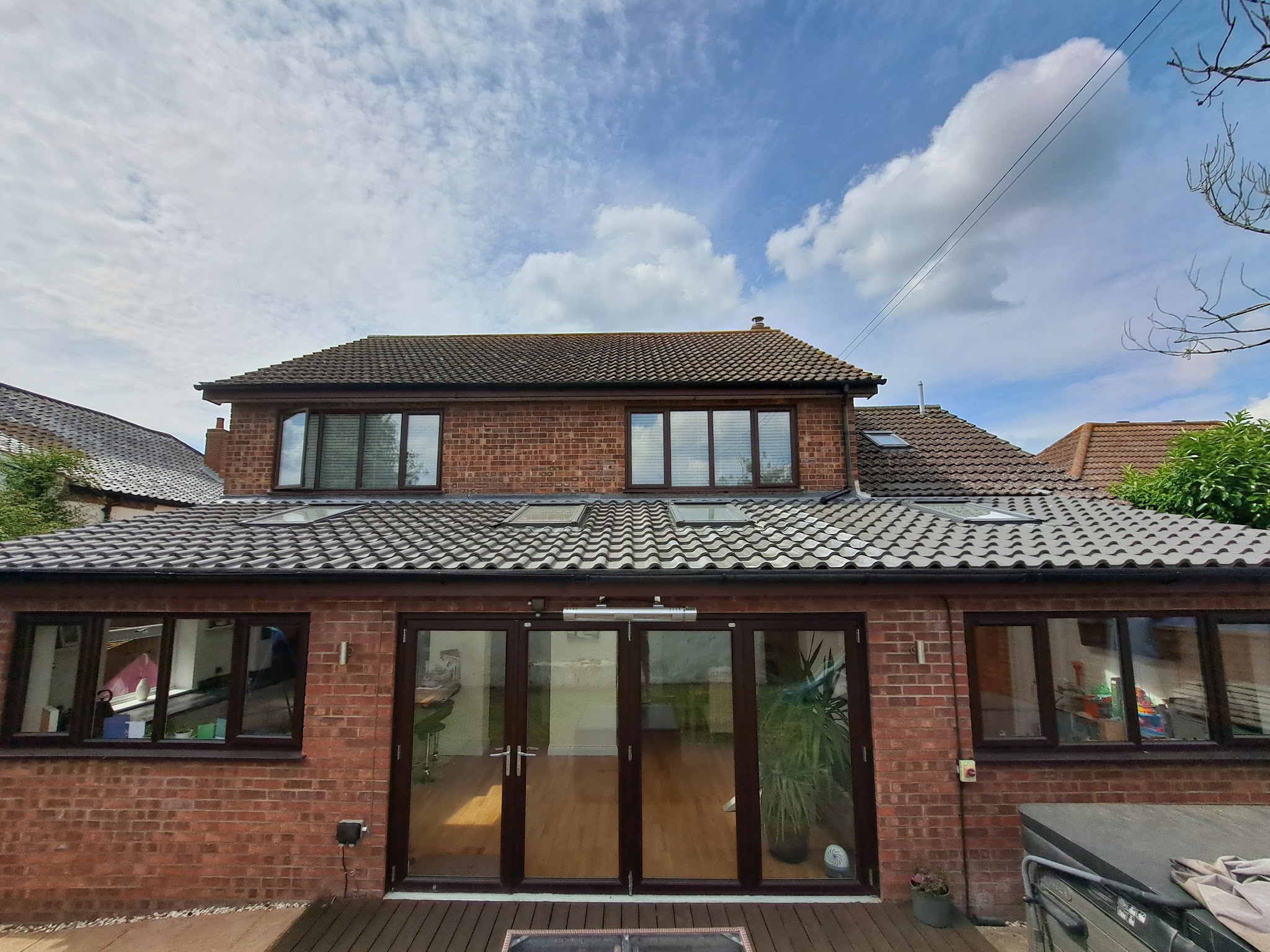 A finished rear extension roof with rooflights